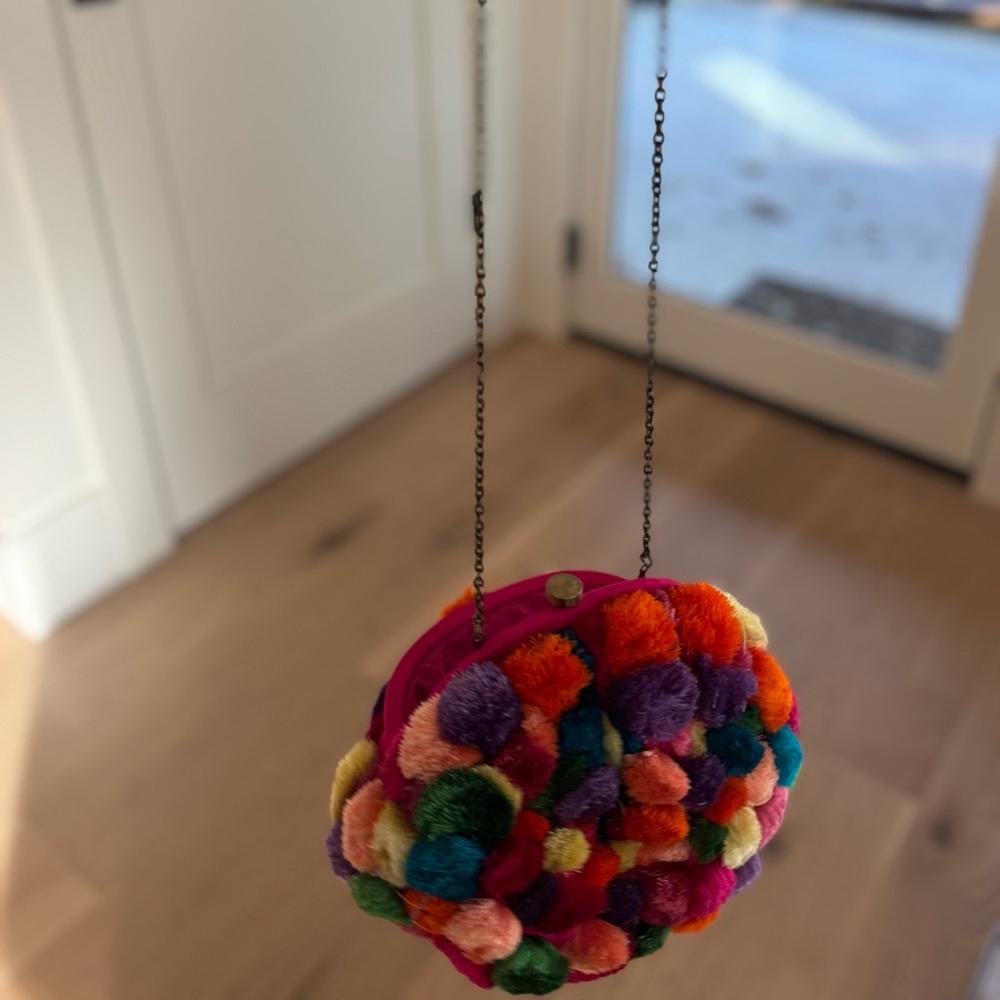 Colorful Pom Pom clutch by Santi Bags